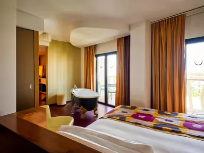Cama o camas de una habitación en Bohemia Suites & Spa - Adults Only
