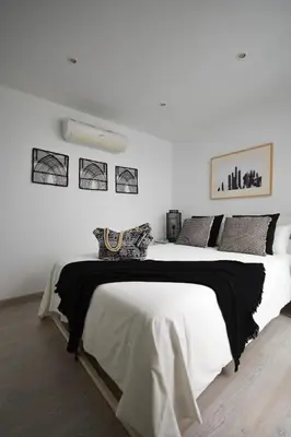 Cama o camas de una habitación en Luminoso loft recién reformado
