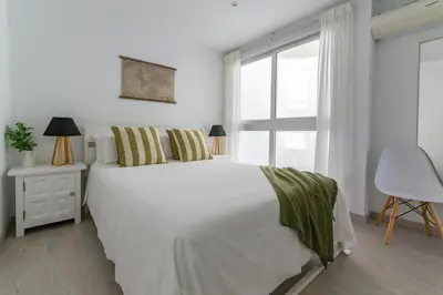 Cama o camas de una habitación en Amplio apartamento recién reformado