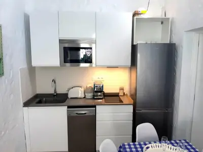 Una cocina o zona de cocina en Tartanas 144 playa del inglés, jumbo