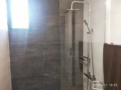 Un baño de CALMA SUITES Maspalomas