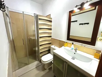 Un baño de Apartamento a pie de playa