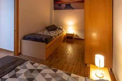 Cama o camas de una habitación en Apartamento a pie de playa
