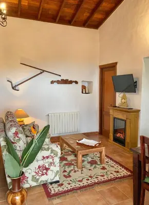 Zona de estar de BELLA DORAMAS Casas Rurales Panchita & Millo