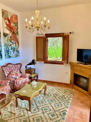 Una televisión o centro de entretenimiento en BELLA DORAMAS Casas Rurales Panchita & Millo