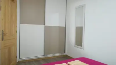 Cama o camas de una habitación en Apartamento la piedra viva 2 arinaga