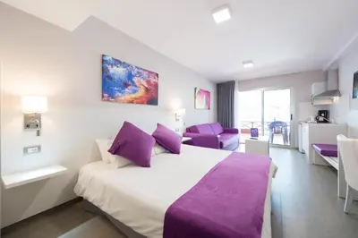 Cama o camas de una habitación en eó Corona Cedral