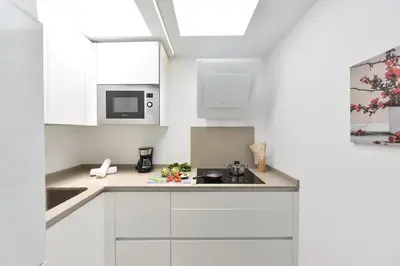 Una cocina o zona de cocina en Cozy Bungalow Playa Flor Maspalomas by VillaGranCanaria