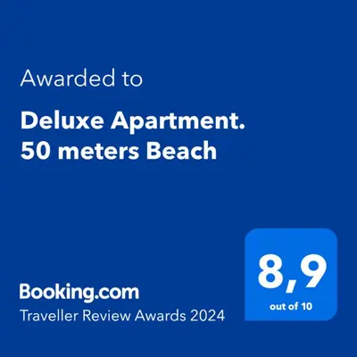Certificado, premio, señal o documento que está expuesto en Deluxe Apartment. 50 meters Beach