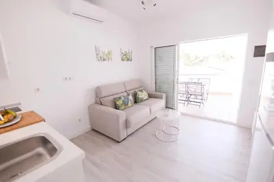 Zona de estar de Deluxe Apartment. 50 meters Beach