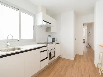 Una cocina o zona de cocina en Las Canteras Beach Apartment Sagasta II