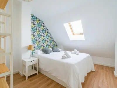 Cama o camas de una habitación en Las Canteras Beach Apartment Sagasta II