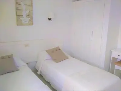Cama o camas de una habitación en Bungalow Duna Flor Maspalomas