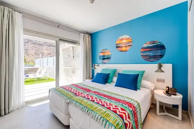 Cama o camas de una habitación en Cordial Mogán Solaz