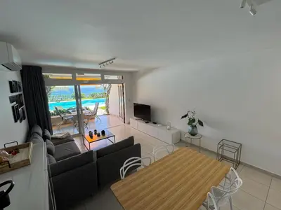 Una televisión o centro de entretenimiento en Apartment Sea View Playa del Ingles