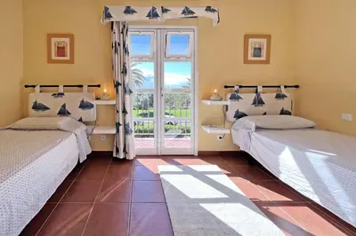 Cama o camas de una habitación en Puerto Marina 18