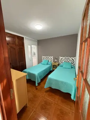 Cama o camas de una habitación en Apartamento playa arinaga