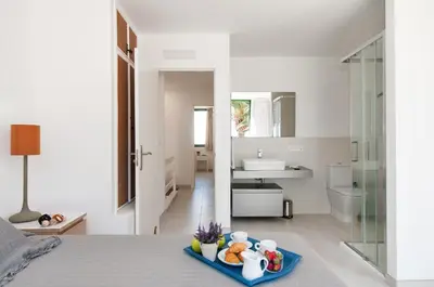 Cama o camas de una habitación en Beachfront Apartment Las Burras FA03 by VillaGranCanaria