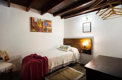 Cama o camas de una habitación en La Cuadra