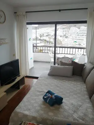 Una televisión o centro de entretenimiento en Habitacion Puerto Rico
