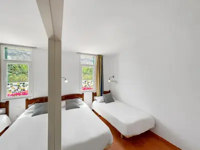 Cama o camas de una habitación en Parque Raquel