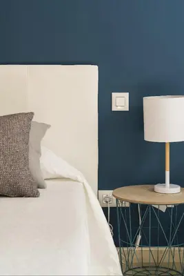 Cama o camas de una habitación en Blue & White House