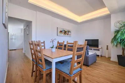 Una televisión o centro de entretenimiento en Apartments Vegueta Suite