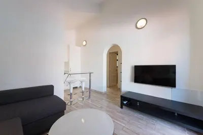 Una televisión o centro de entretenimiento en Maspalomas Precioso bungalow, Sonnenland