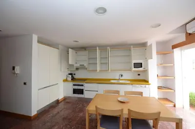 Una cocina o zona de cocina en ESPECTACULAR ATICO CON TERRAZA A 50 MT PLAYA CANTERAS