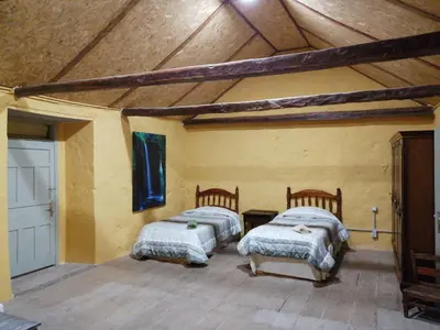 Cama o camas de una habitación en Casa rural la cruz