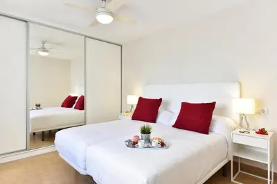Cama o camas de una habitación en Apartment over the sea Las Canteras MC by VillaGranCanaria