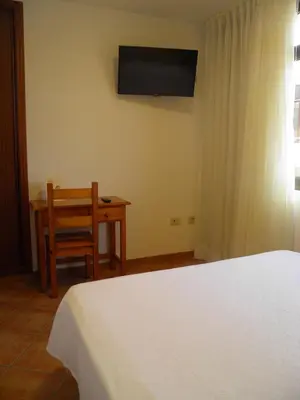 Cama o camas de una habitación en Hostal Albacar