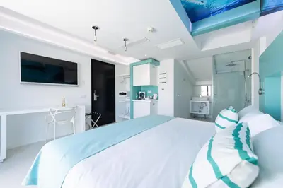 Cama o camas de una habitación en HD Acuario Lifestyle