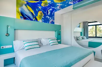 Cama o camas de una habitación en HD Acuario Lifestyle