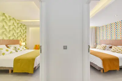 Cama o camas de una habitación en Mogan Beachfront apartment V&L by VillaGranCanaria
