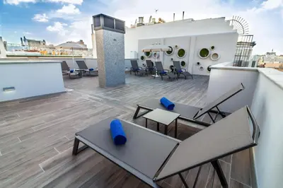Un balcón o terraza de URBANSEA Holiday Homes