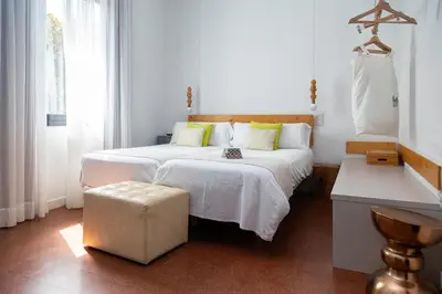 Cama o camas de una habitación en Hotel Catalina