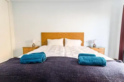 Cama o camas de una habitación en Canteras Luxury Beach Apartments