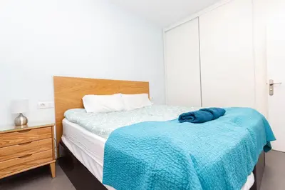 Cama o camas de una habitación en Canteras Luxury Beach Apartments