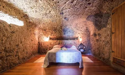 Cama o camas de una habitación en Casa Cueva Las Margaritas By Artenatur