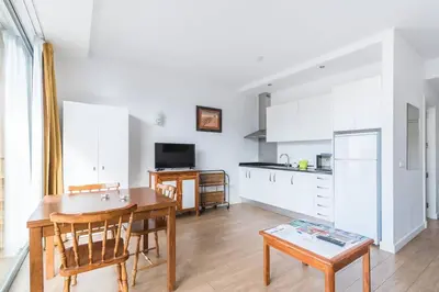 Una cocina o zona de cocina en Loft moderno con balcón al lado de Las Canteras