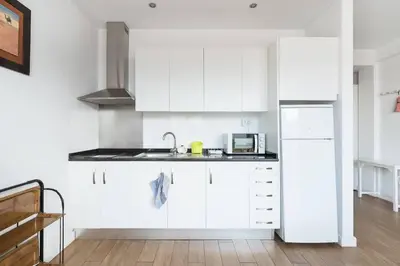 Una cocina o zona de cocina en Loft moderno con balcón al lado de Las Canteras
