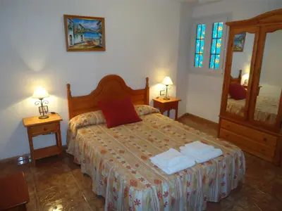 Cama o camas de una habitación en La Fonda Aeropuerto