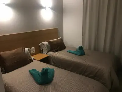 Cama o camas de una habitación en Las Fresas Puerto Rico