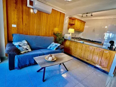 Una cocina o zona de cocina en Cozy Apartment Near Yumbo