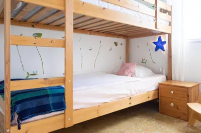 Cama o camas de una habitación en Casa Jazmín