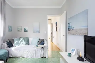 Una televisión o centro de entretenimiento en Casa Jazmín