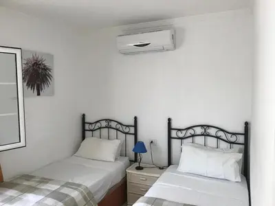 Cama o camas de una habitación en Bungalow Isla Margarita