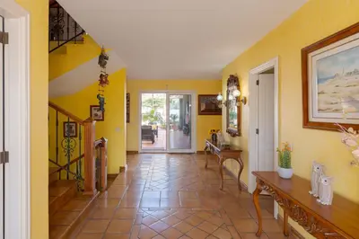 Una televisión o centro de entretenimiento en Villa Maspalomas Golf Court