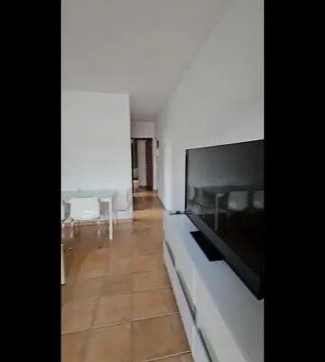 Cama o camas de una habitación en Apartamentos Ciudad Jardín